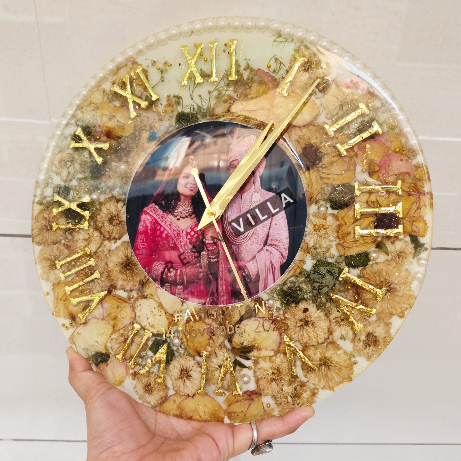 handcrafted resin art wall clock with preserved wedding varmala